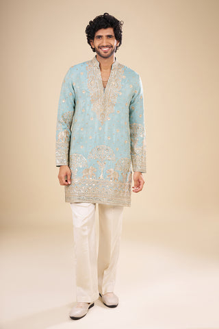 Turquoise Blue Silk Kurta Set with Nature-Inspired Embroidery